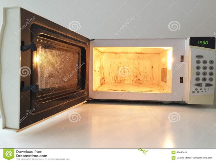 dirty-microwave-oven-inside-69445414